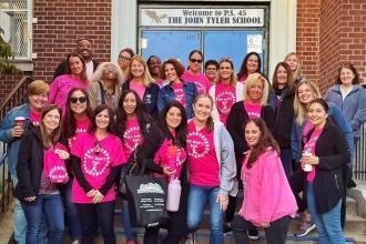 Staffers at PS 45 on Staten Island wear pink in memory of Denise Budde, a prekindergarten teacher and chapter leader who died of breast cancer in 2019. 