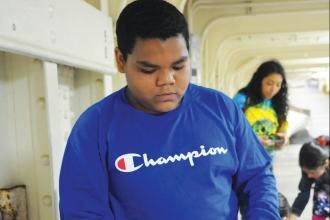 Student examines a rope