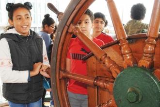 Students take turns at the ship’s wheel
