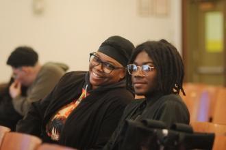 A parent and her son smile for a photo during the 2025 Staten Island Parent Conference on Nov. 8, 2025. 