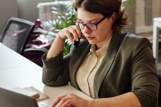 teacher phone call laptop generic