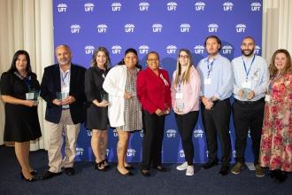Honored for their strong negotiation skills and ensuring gains in pay and a safer workplace, members of the Federation of Nurses/UFT’s negotiating team at NYU-Langone Hospital Brooklyn receive Backer/Scheintaub Awards from Anne Goldman (far left), the UFT vice president for non-DOE and private-sector members.