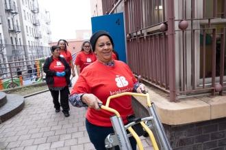 Parent volunteers at Manhattan’s PS 4 await the arrival of produce on Nov. 21, 2025, to pack up for families in need.