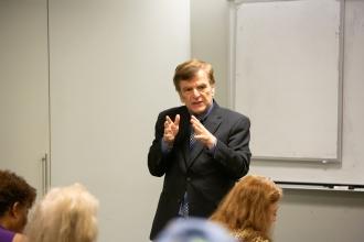 Frank Sorrentino, a retired St. Francis College political science professor, addresses retirees during a lecture titled, “The Politics of the Supreme Court” during the UFTWF Day at the University on June 13, 2025. 