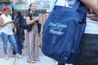 A bag that reads "Proud union member"