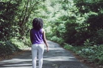 woman walking forest generic 
