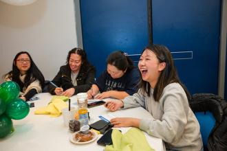 Pre-K Center teachers share a laugh at the 2024 UFT Early Childhood Conference.