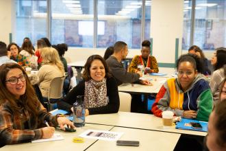 A group of members interact during workshops