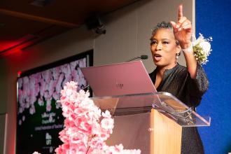 UFT Family Child Care Providers Chapter Leader Tammie Miller welcomes the crowd at the 2024 UFT Provider Award Ceremony at UFT Headquarters on May 10, 2024.