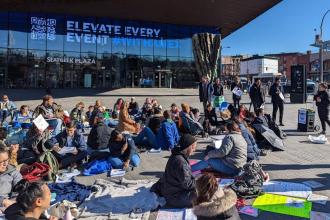 A large group of UFT members hold their day of action at the Barclays Center