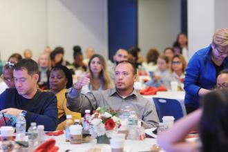 VNS Health nurse Kaiser Mojica comments during a question-and-answer session at the Federation of Nurses/UFT Professional Issues Conference on Nov. 15, 2024. 