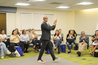 Nationally recognized arts educator Rodney Eric Lopez interacts with attendees at the NYC Association of Foreign Language Teachers/UFT annual fall conference at union headquarters.  