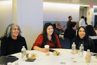 A table of school psychologists listen to a presentation during Psychologist Appreciation Day at UFT headquarters on Nov. 8, 2024. 
