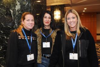 PS 200, Brooklyn, teachers (from left) Kris Norris, Danielle Caracciolo and Christine Perez arrive at Teacher Union Day on Nov. 3, 2024 at the Midtown Hilton.