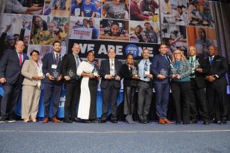 Albert Lee Smallheiser Award winners pose for a photo on stage at Teacher Union Day on Nov. 3, 2024 at the Midtown Hilton