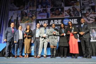 Audrey Chasen Award winners take the stage for a group photo at Teacher Union Day on Nov. 3, 2024 at the Midtown Hilton. 