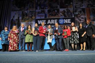 UFT Collective Action Award Honorees take the stage at Teacher Union Day on Nov. 3, 2024 at the Midtown Hilton. 