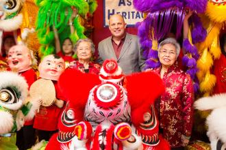 UFT President Michael Mulgrew smiles and poses with Marion Thom and Virginia Eng