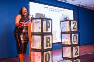 UFT Vice President for Academic High Schools Janella Hinds, the architect and emcee of the event, addresses members in attendance at the UFT Academic High School Awards on April 25, 2025. 