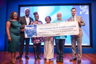 Members from Urban Assembly Bronx Academy of Letters are positively beaming as they win a Team High School Award.
