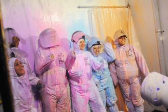 New UFT members smile as they get paint "bombed" during a new member event on Feb. 27. 