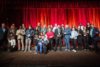 Queens CTE award winners take a group photo with UFT representatives at the 2025 UFT Career and Technical Education Awards at the Sheraton New York Times Square Hotel on Feb. 26, 2025.