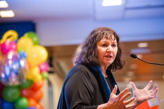 Leslee Udwin, founder of Think Equal, a program for social and emotional learning, addresses attendees at the UFT Early Childhood Conference on April 5, 2025. 