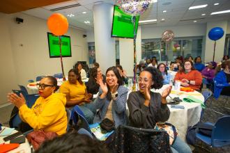 Educators cheer for the winner of a raffle awarded during the UFT Early Childhood Conference on April 5, 2025. 