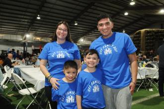 Special education teacher Catherine Porcaro of PS 15 in Queens enjoys the day with her family at UFT Family Day on March 29, 2025.