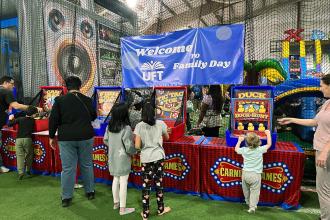 Attendees play carnival games at UFT Family Day on March 29, 2025. 