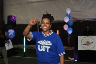 UFT Queens Member Representative DeShanna Barker smiles for a photo at UFT Family Day on March 29, 2025. 