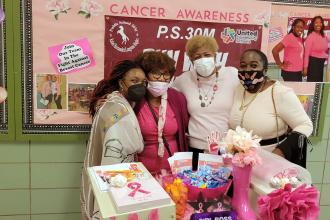 Raising awareness at PS 30 in Manhattan are (from left) art teacher Yolanda Lyn, District 5 Paraprofessional Representative Dorothy Matthew, Chapter Leader Rudine Wright and UFT District 5 Representative Zina Burton-Myrick.