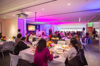 Attendees at the 2025 HERstory brunch listen as UFT President Michael Mulgrew pays tribute to women who’ve mentored him.