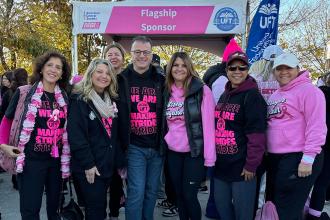 UFT members on Staten Island take a group photo at a breast cancer awareness walk.