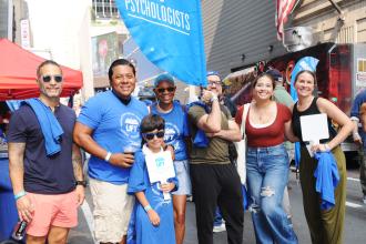 UFT social workers and psychologists take a group photo during the 2025 La