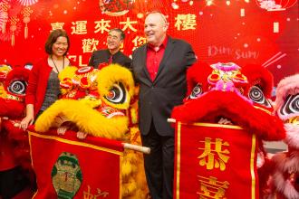 Posing with the dancing lions are (from left) UFT Treasurer Victoria Lee, Asian American Heritage Committee Chair Seung Lee and UFT President Michael Mulgrew at the 2025 UFT Asian Heritage Committee Lunar New Year Banquet.