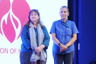 Nurses Fran Altieri (left) of NYU Langone–Brooklyn and Sultana Albasic of VNS Health are honored with the Trailblazer Award at the 2025 Federation of Nurses/UFT Nurses Recognition Day celebration. 