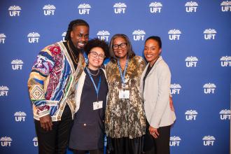 Honoree  Sonia A. Riley (second from right), a paraprofessional at Brooklyn’s Kurt Hahn Expeditionary Learning School, celebrates with members of her family at the 2025 UFT Paraprofessionals Awards Luncheon on March 22, 2025. 