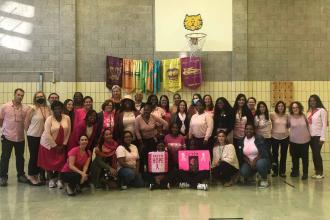Teachers pose for Pink Day