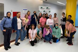 Teachers pose for Pink Day