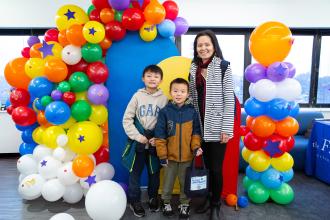 Parent Cindy Tang attends the conference with her 2nd- and 6th-graders in tow.