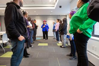 Presenter Dalisha Rodriguez (center) leads participants through an activity during the “Through the Storm” workshop.