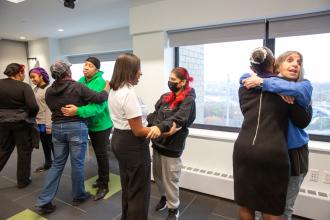  Parents and caregivers share hugs.