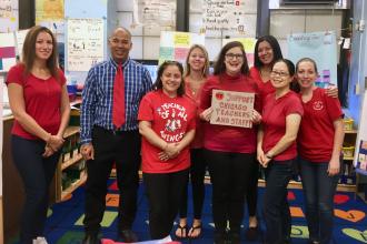 Group of UFT members wearing red
