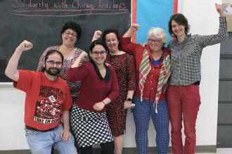 Group of UFT members wearing red
