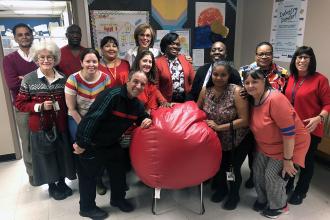 Group of UFT members wearing red