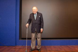 Retiree David Shustak, who began his career in 1955 and joined the UFT in 1960, accepts his award for 70 years of service during the UFT Retired Teachers Chapter Luncheon on May 23, 2025. 