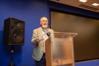 RTC Chapter Leader Bennett Fischer greets retirees in attendance at the UFT Retired Teachers Chapter luncheon on May 23, 2025. 