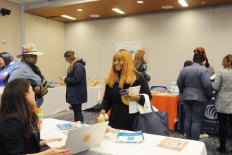 School counselors gather information in the exhibit hall at UFT headquarters during the union’s 21st annual School Counselors Conference.