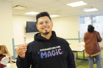 School counselor Francis Bido Mota of Pathways to Graduation in the Bronx takes part in the workshop “Prioritizing Your Routine to Unlock Your Full Potential" at the 2025 UFT School Counselors Conference
